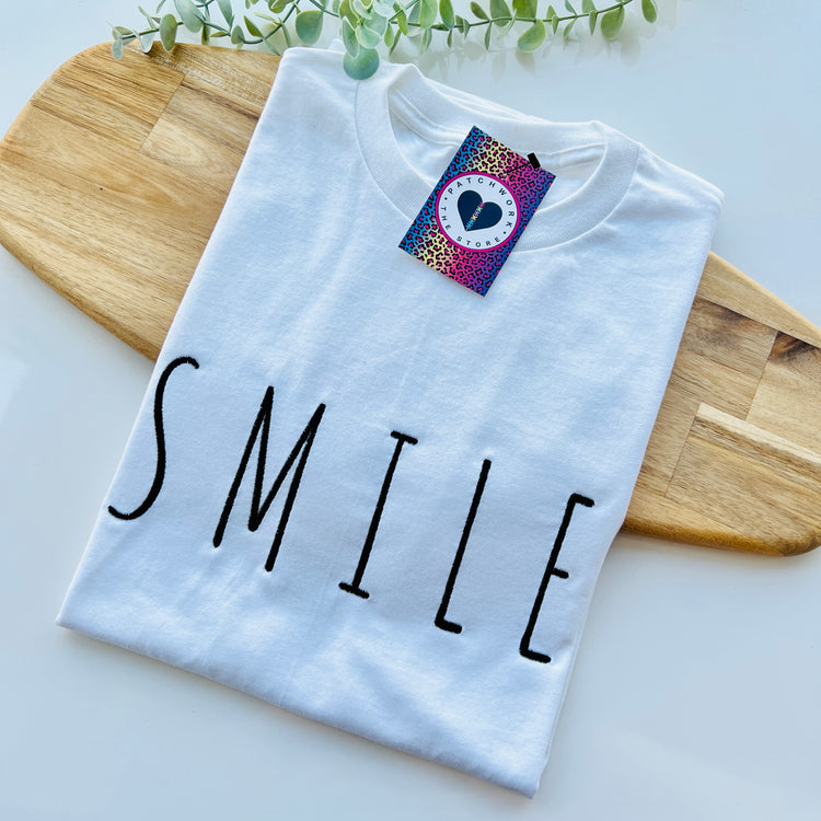 White & Black “Smile” Unisex Adults Embroidered T-Shirt