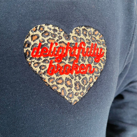 Unisex Adults "Delightfully Broken" Leopard Print Embroidery Unisex Sustainable Sweatshirt